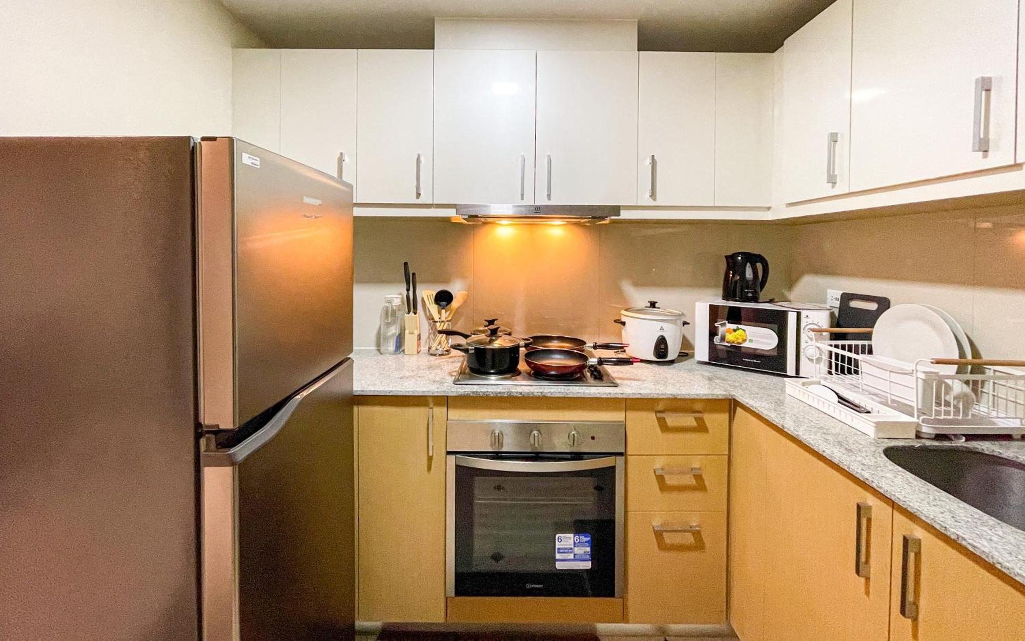 تاغويغ Cityscape View 2Br In Uptown Bgc W 200Mbps Wifi المظهر الخارجي الصورة
