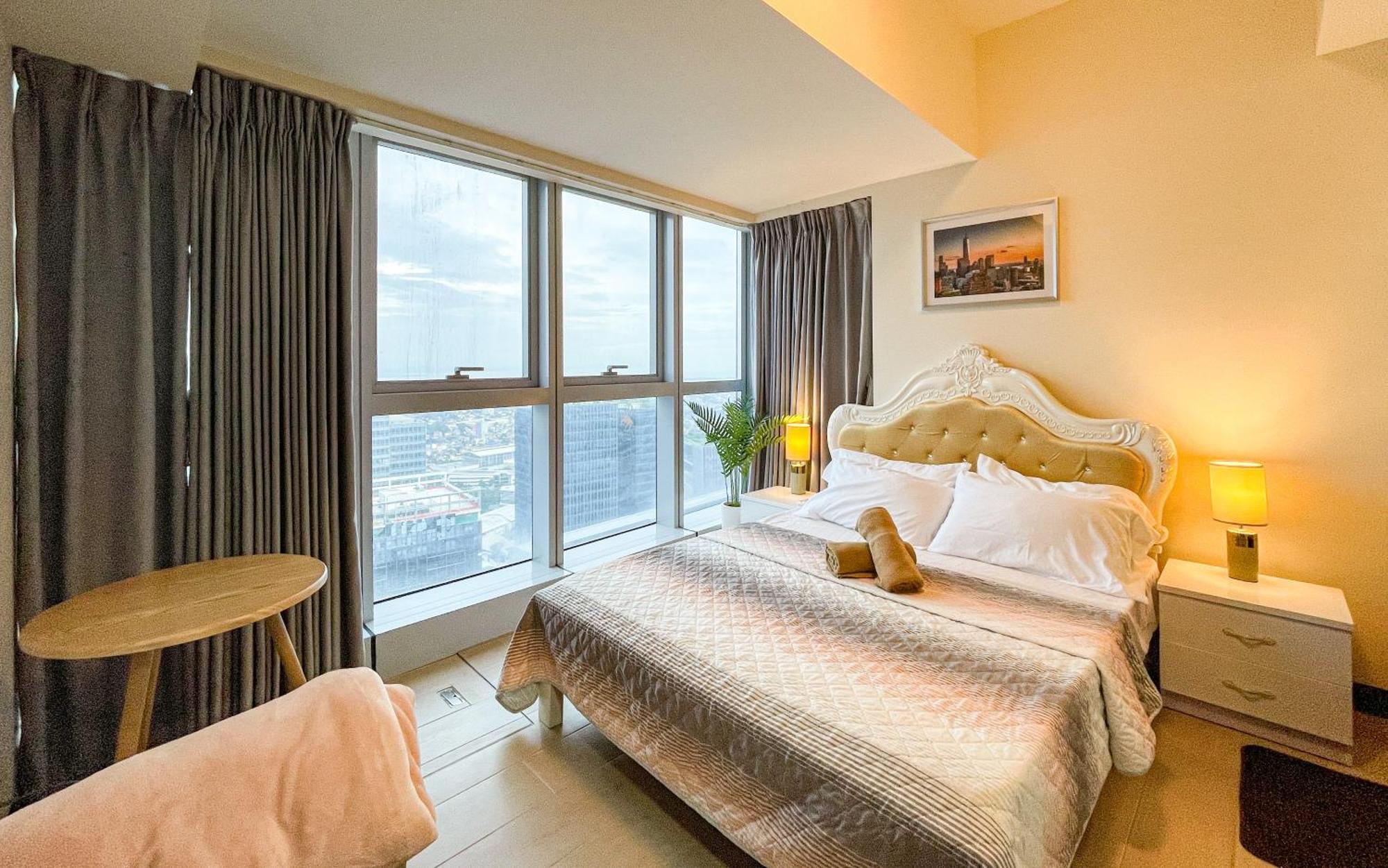 تاغويغ Cityscape View 2Br In Uptown Bgc W 200Mbps Wifi المظهر الخارجي الصورة