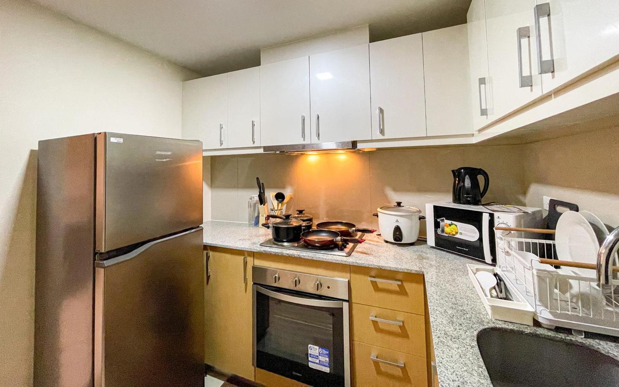 تاغويغ Cityscape View 2Br In Uptown Bgc W 200Mbps Wifi المظهر الخارجي الصورة